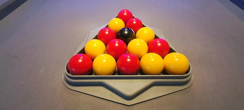 Pool balls forming a triangle on a pool table: ready for the break 写真素材