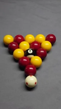 Pool balls setup as blackball and international rule set Stock Photos