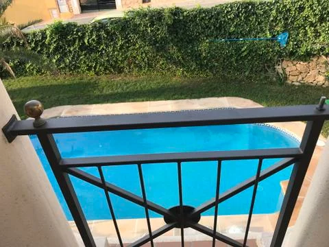 Pool behind a gate Stock Photos