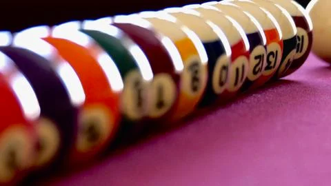 Pool Billiard balls on red table Stock Photos