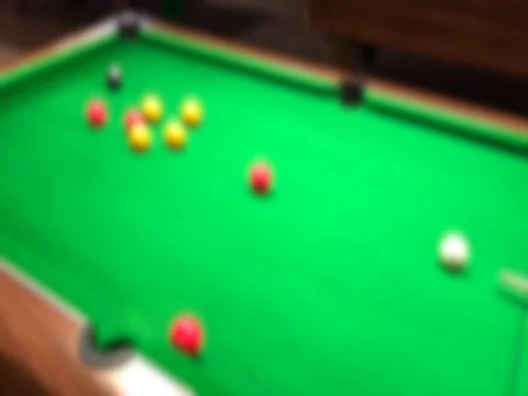 Pool billiards game cue 8 ball green table blurred abstract background Stock Footage 72569862