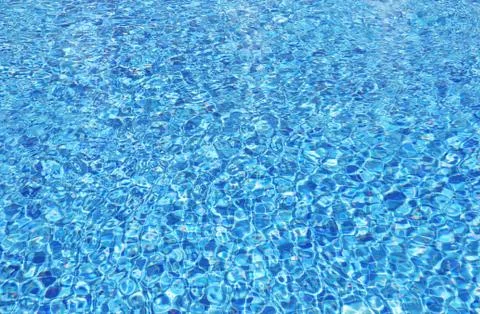 Pool blue water background Stock Photos