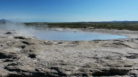Pool with bright blue toxic thermal water in Geysir area, Iceland Stock Footage 33787814