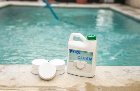 Pool cleaning chlorine tablets kit, pool cleaning chlorine tablets close up.. Stock Photos