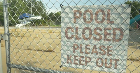 Pool Closed Sign Close Up against Water Slide Stock Footage 42108105
