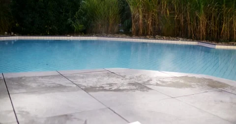 Pool Cover Closes Automatically Over the Pool in Morning Mist Stock Footage 340260823