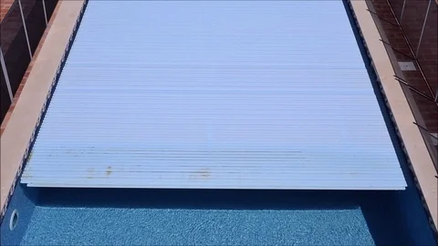 Pool cover opening Stock Footage 111334118