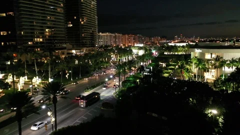 Pool decks lit below the Bal Harbour towers 库存影片 100096939
