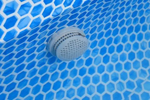 Pool filter in blue swimming pool liner Foto stock