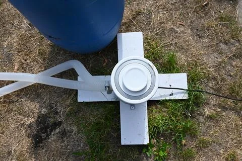 Pool filter on grass with hoses Foto stock