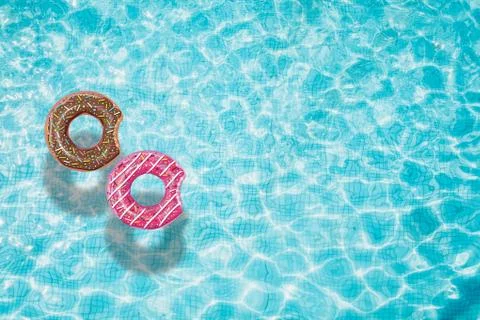 Pool float, ring floating in a refreshing swimming pool Stock Photos