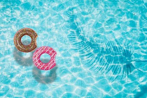 Pool float, ring floating in a refreshing swimming pool Stock Photos