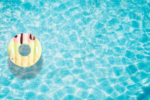 Pool float, ring floating in a refreshing swimming pool Stock Photos
