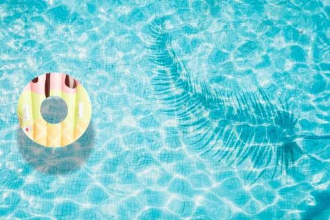Pool float, ring floating in a refreshing swimming pool Stock Photos
