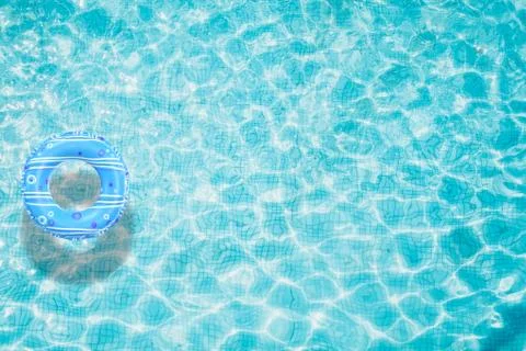 Pool float, ring floating in a refreshing swimming pool Stock Photos