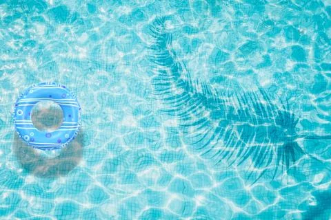 Pool float, ring floating in a refreshing swimming pool Stock Photos