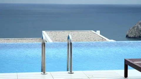 A pool with flowing water on the background of the sea Stock Footage 83563422