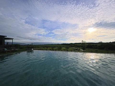 Pool full with water with beautiful view on peaceful nature Stock Photos