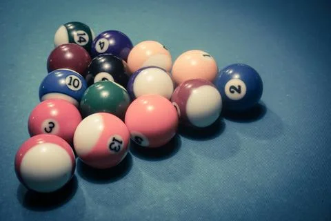 Pool game - balls in triangular shape on a table Stock Photos