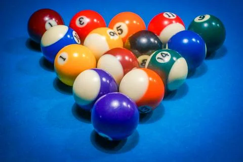 Pool game - balls in triangular shape on a table Stock Photos