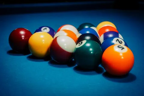 Pool game - balls in triangular shape on a table Stock Photos