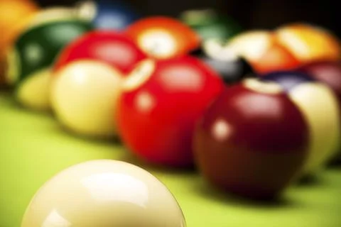 Pool game on green table Stock Photos