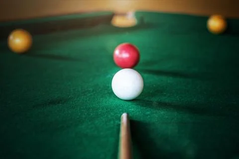 Pool game on green table Stock Photos