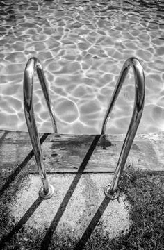 Pool with grass Stock Photos