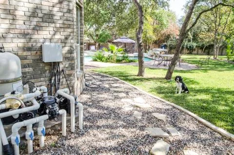 Pool Heating Unit with swimming  pool in background Photos