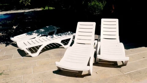 Pool Lounge Chairs 2 Stock Footage 83927889