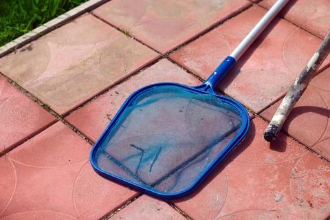 Pool mesh abandoned on the ground 库存照片