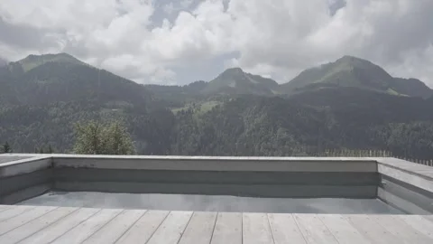 Pool with mountain view, cloudy sky, 4K, Log Stock Footage 241028838