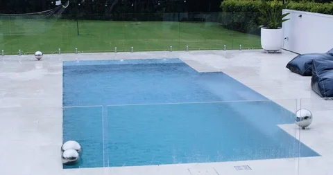 Pool over flowing and flooding in heavy torrential rain 스톡 동영상 122466499