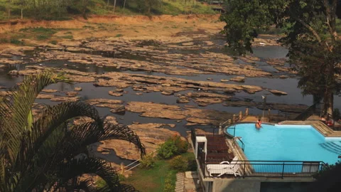 Pool overlooking the landscape of a tropical mountain river Video stock 148119395