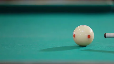 Pool player hit the white cue ball with the cue to break pyramid of balls on Stock Footage 333265987