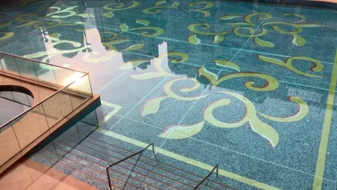Pool reflections and floral patterns at sunset Stock Footage 323575875