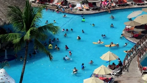 Pool at a resort and children playing Stock Footage 81182528