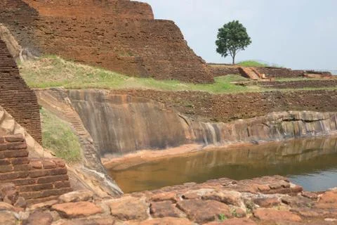 Pool in the royal garden palace complex on the top of Sigiriya Rock or Lion R Stock Photos