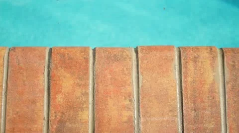 Pool Side Bricks and Coping Stock Footage 12097092