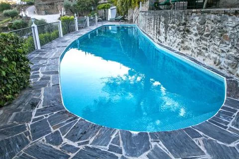 Pool at a small hotel Stock Photos