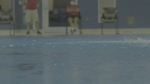 Pool Splashing With lifeguards Watching Video stock 165608984