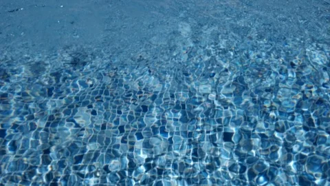 Pool surface with running pump Stock Footage 109130542
