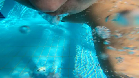 Pool . The swimmer sails in the style of a crawl. Sports. Training swimmer. Stock Footage 86462048