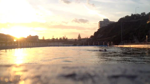 Pool Swimming At Sunset Stock Footage 29155199