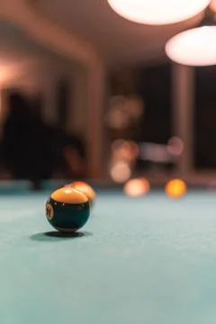 Pool table ball from close perspective blurry. Stock Photos