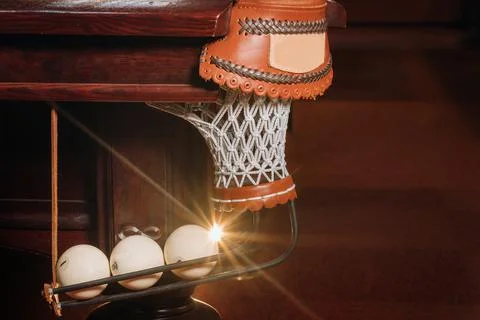 A pool table with balls that have already been played in the pool club.Playin Stockfoto's