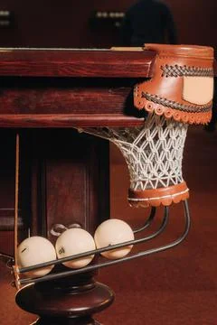 A pool table with balls that have already been played in the pool club.Playin 스톡 사진