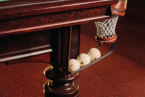 A pool table with balls that have already been played in the pool club.Playin 写真素材