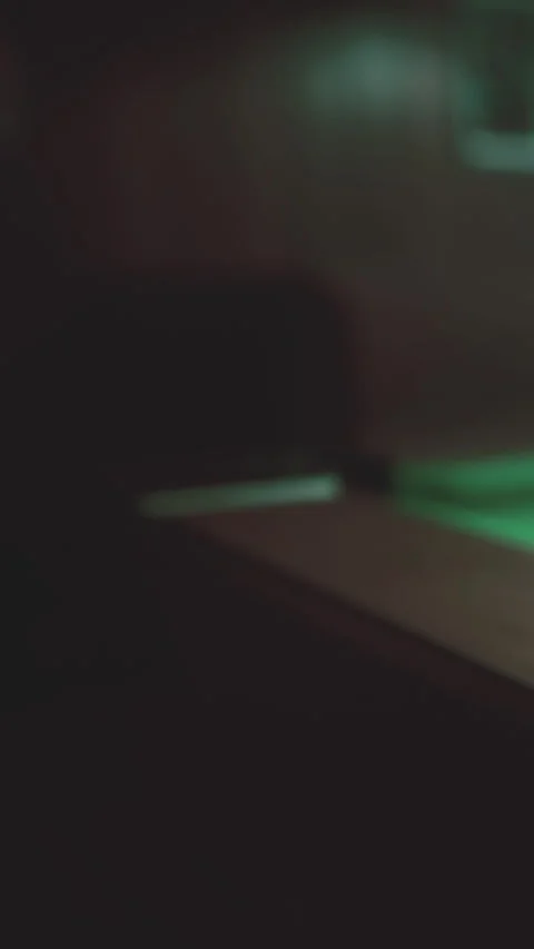 Pool table in dim light with cue ball and focus on shot preparation Stock Footage 337976124