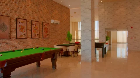 Pool table game in new club house Stock Footage 295919950